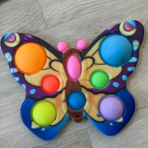 Hard plastic dimple pop perfect for babies sanitizable like new 4 total fodgets - Picture 3 of 6